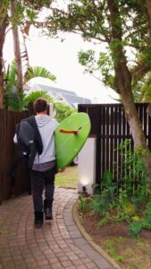 Home 112 Surfer leaving gate