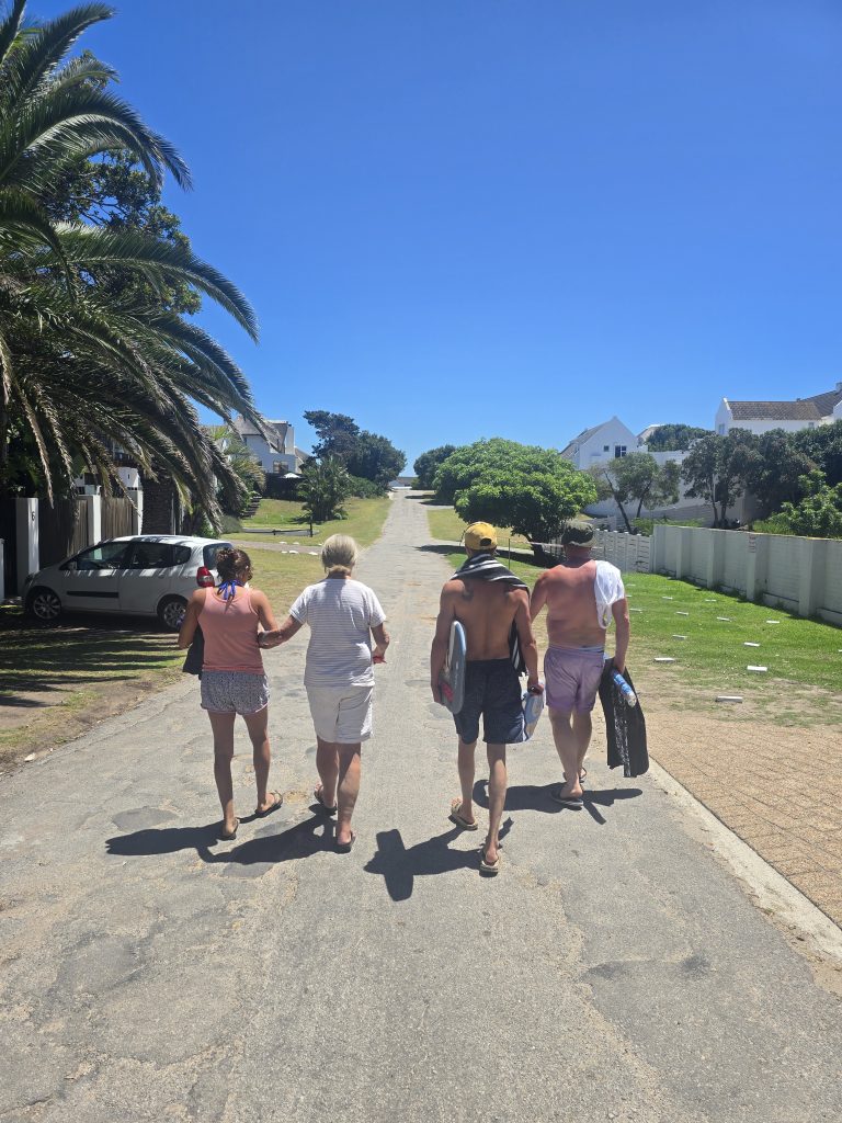 Discovering Your True Identity | Recovery addiction center 4 A group of people walking together outdoors on their journey to wellness at a recovery addiction center.