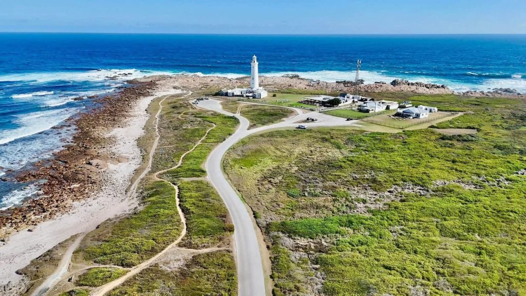The Power of Denial Part 2 | Center for Addiction Treatment 3 A breathtaking aerial view of the St Francis Bay lighthouse and the vast ocean, capturing the serene surroundings of our center for addiction treatment.